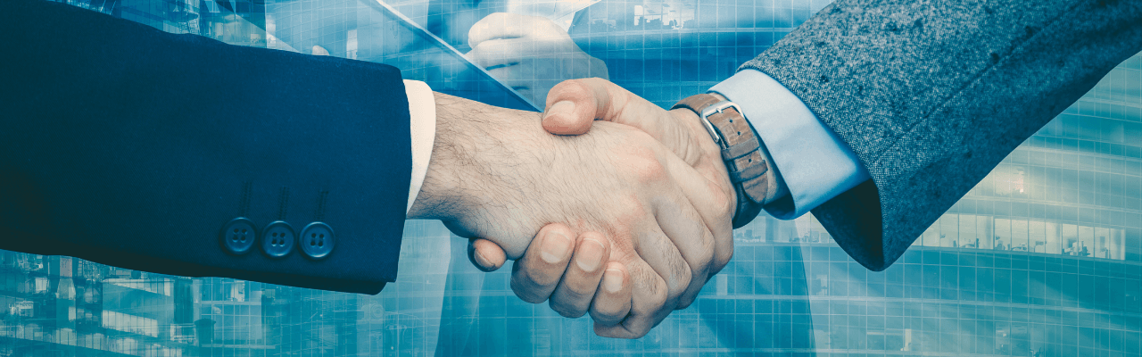 What Makes the SEZ a Game-Changer for Businesses Business professionals shaking hands with overlay icons symbolising the special economic zone meaning in practice.